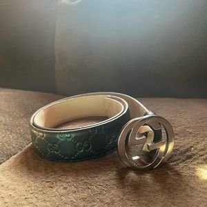 Black leather embroidered Gucci belt